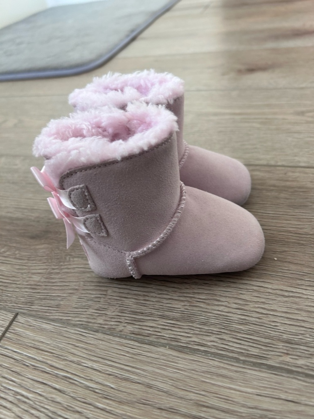 UGG Pink Baby Booties with Fur Trim and Back Bows